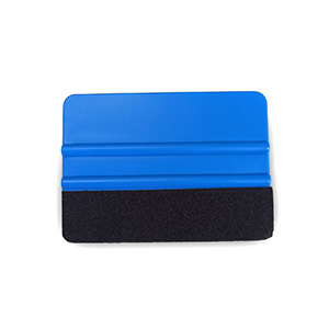 Aplikační stěrka na samolepky